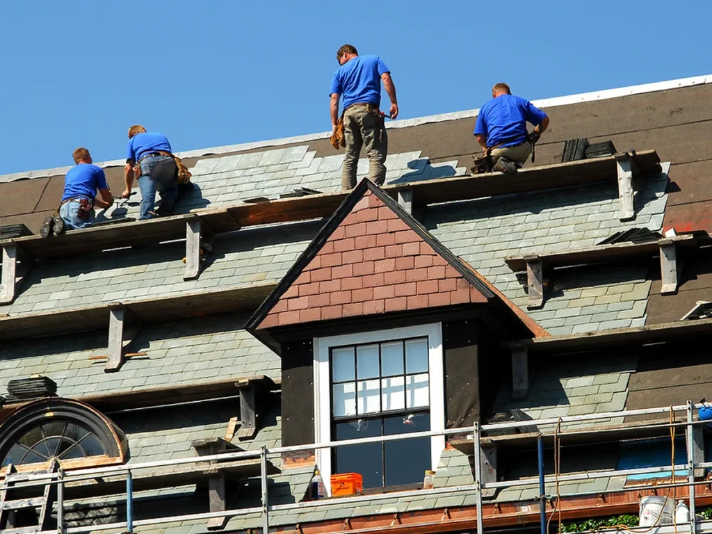 Preferred Roofing crew re-roofing a steep-pitch home in Los Angeles County